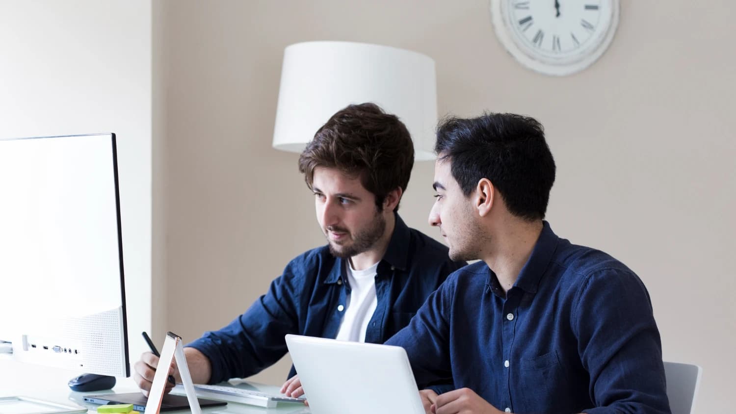 Teams collaborating on custom software development